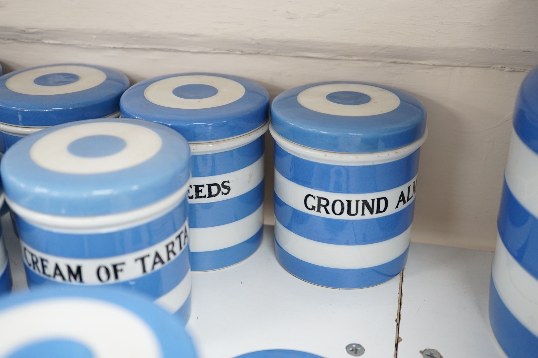 T.G.Green Cornish Kitchenware, thirteen 8.5cm lidded storage jars to include Ginger, Caraway-Seeds, Cream of Tartar, Cinnamon, Spice and Cloves, Black Shield marks, (lacks one lid and one a.f.) Condition - poor, fair and